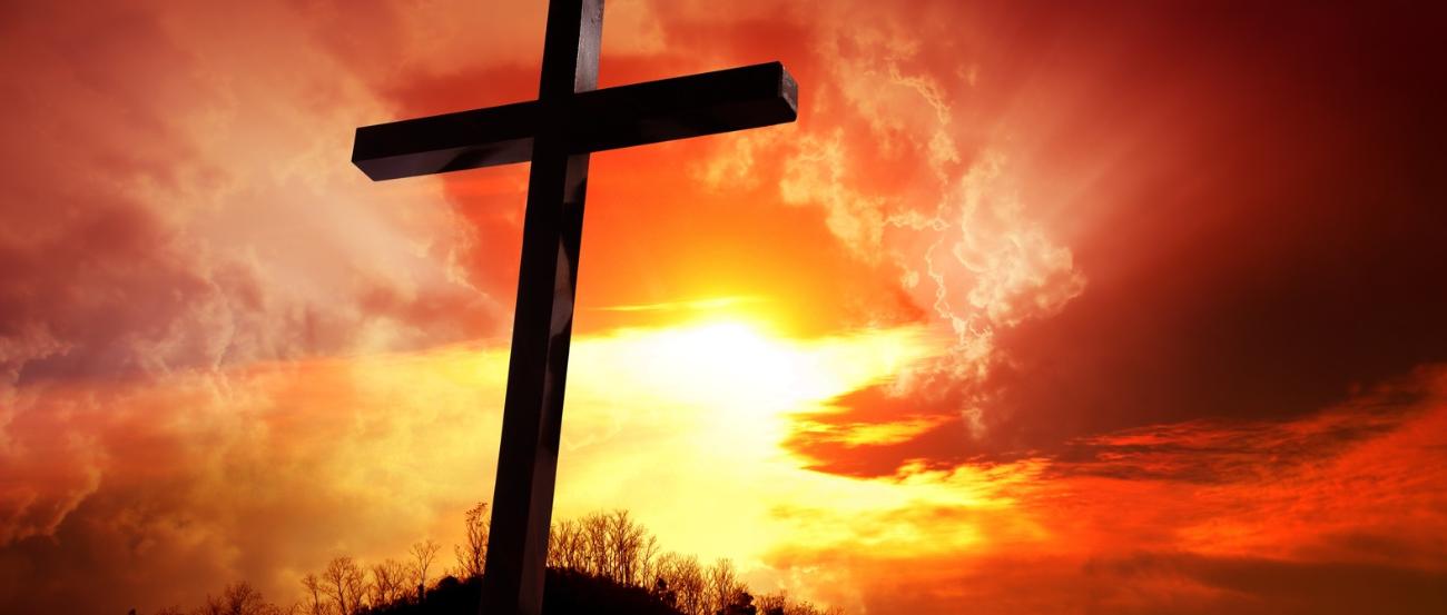 Kreuz vor Sonne